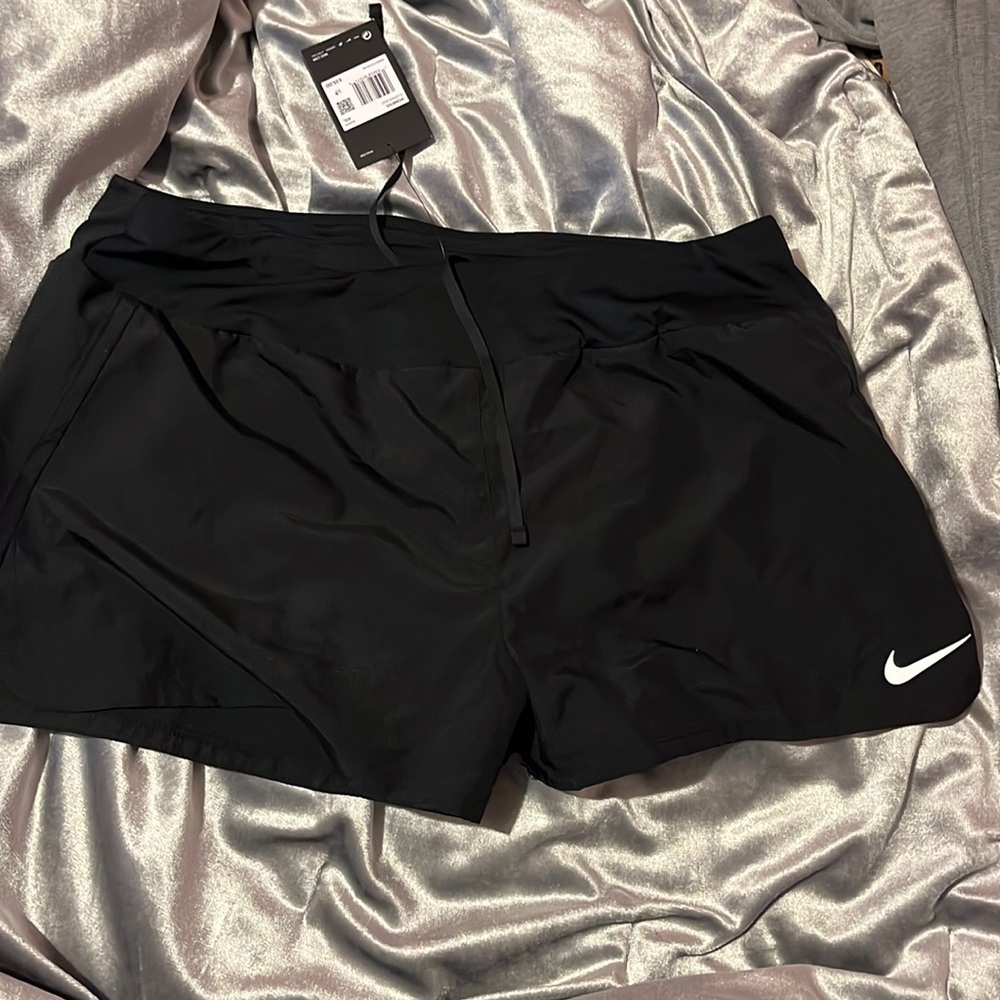Nike dri-fit shorts. New with tags, never worn, perfect condition.